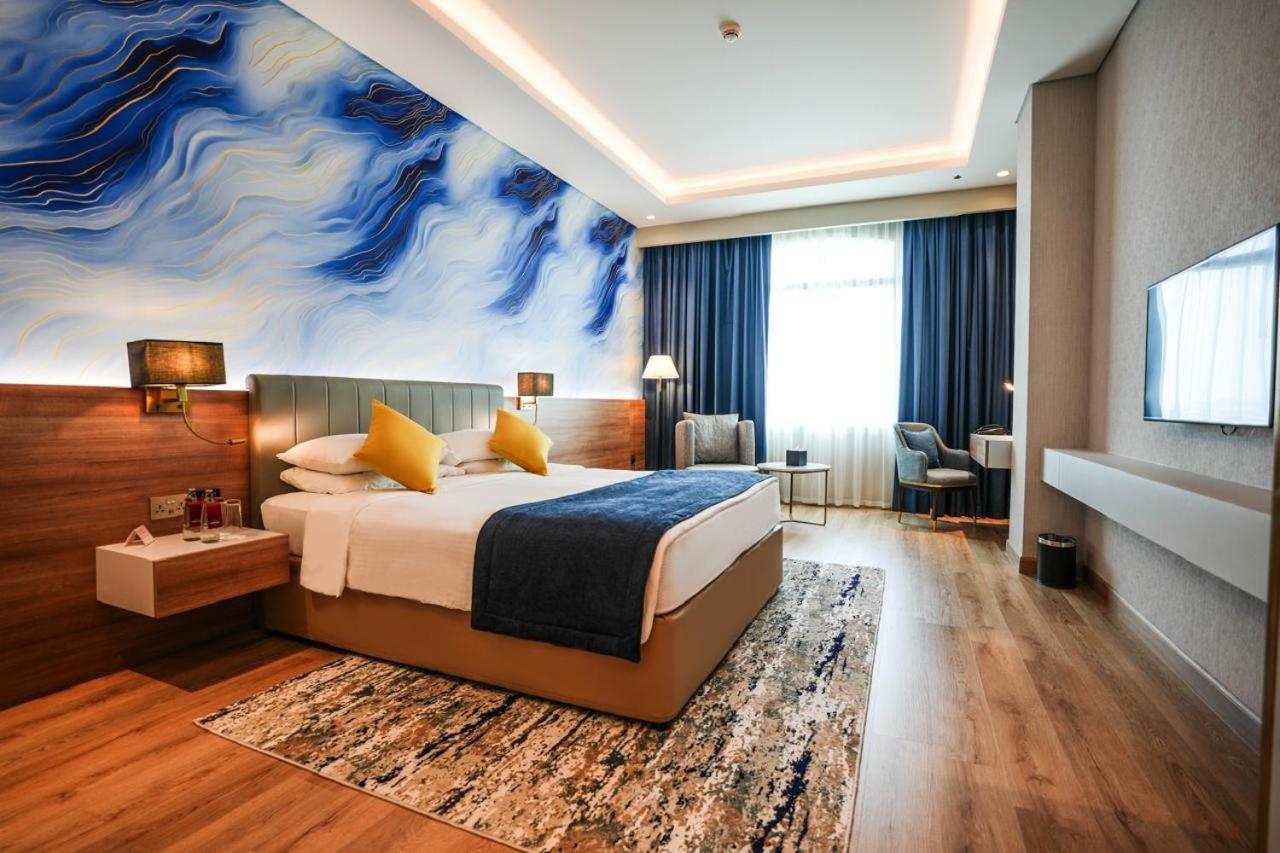 เมอเวนพิค แกรนด์ อัล บุตัน ดูไบ Hotel ภายนอก รูปภาพ